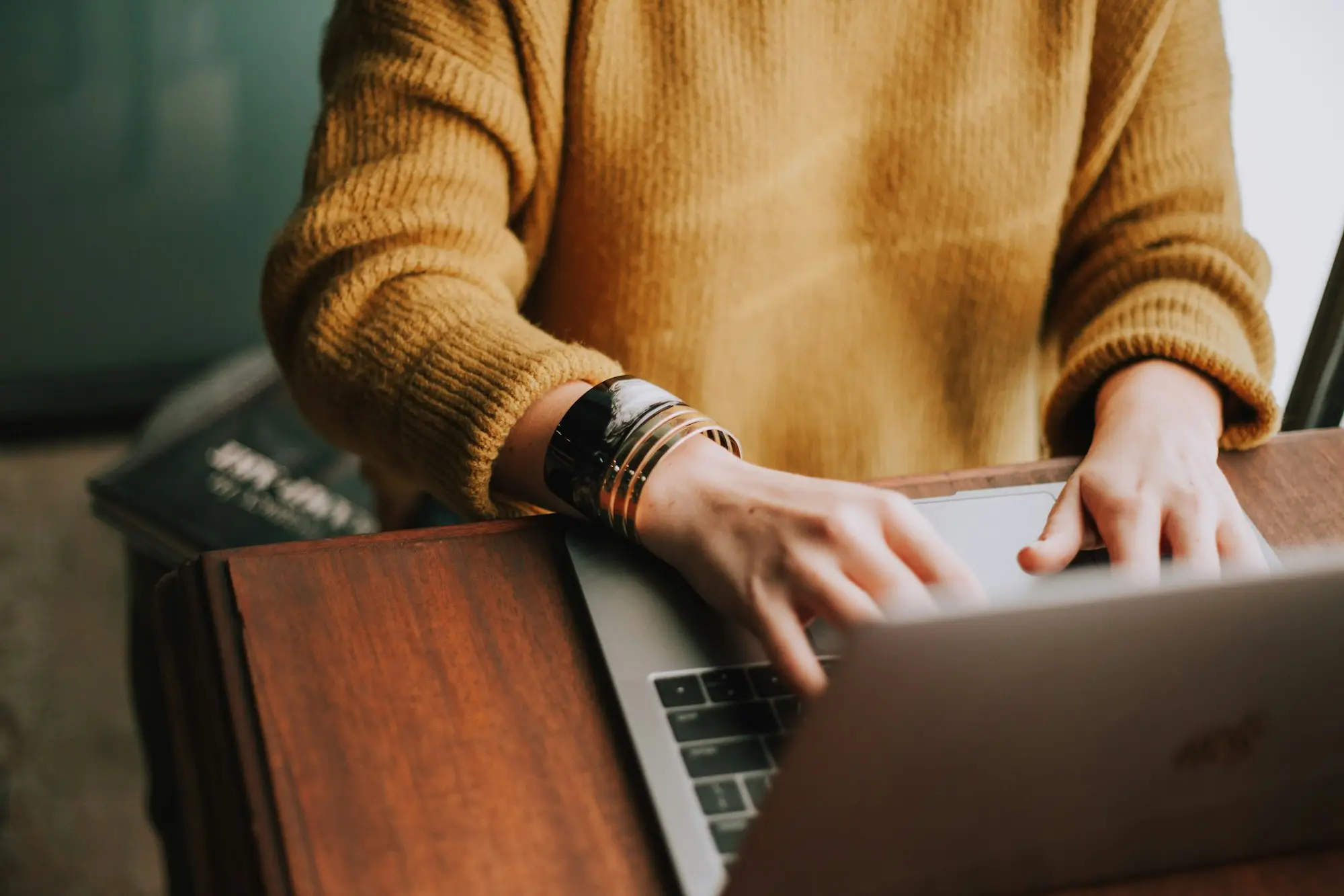 Person reviewing a statement on a laptop
