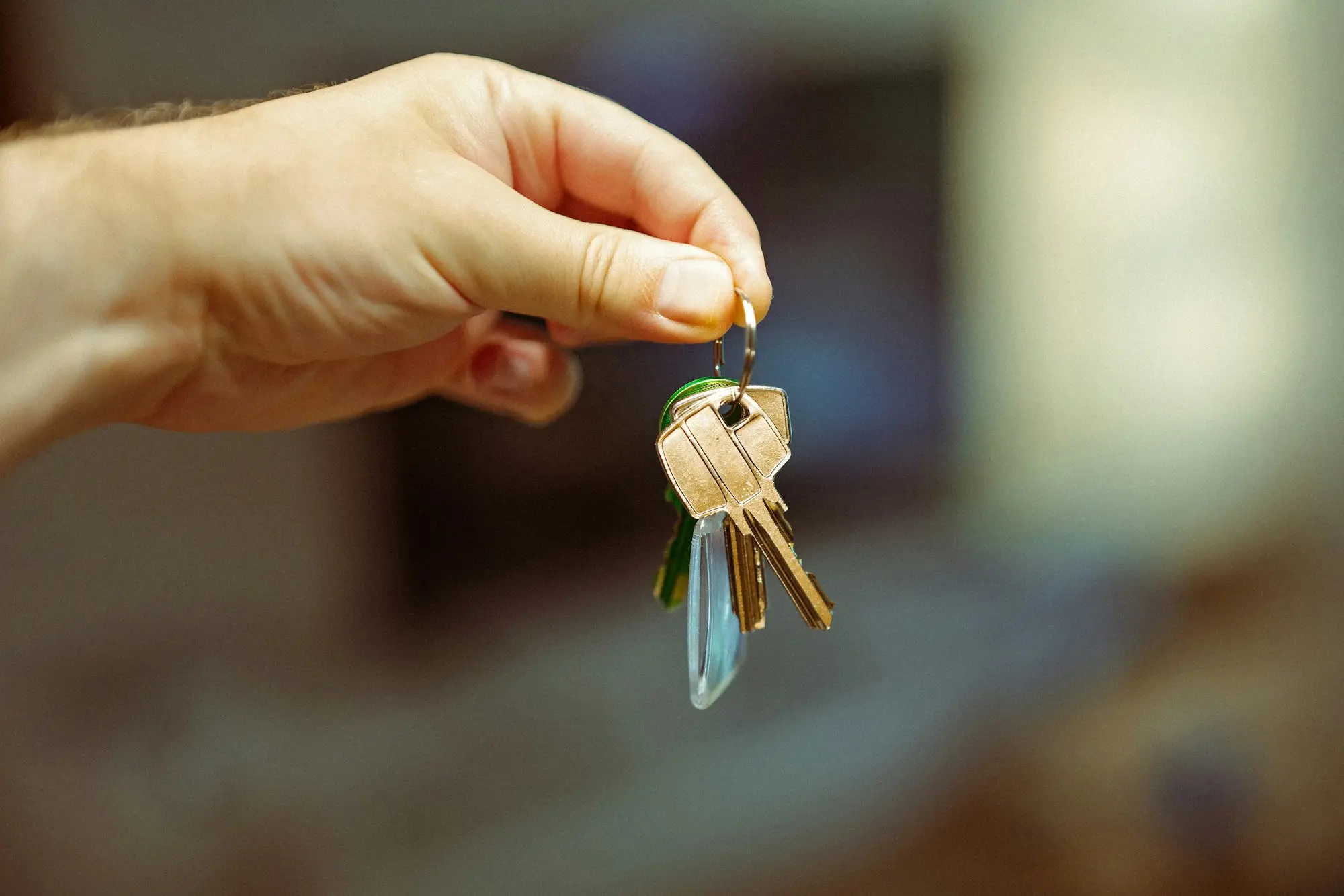 Hand holding a bunch of keys