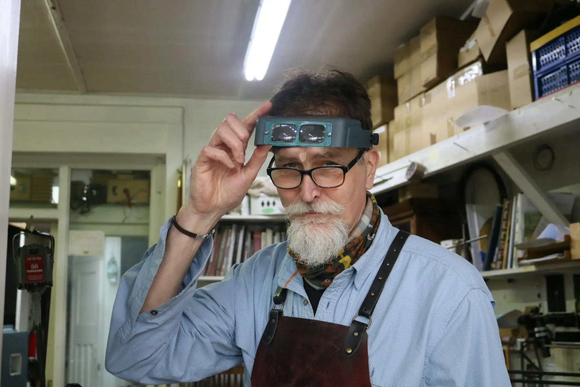 Experienced craftsman in his workshop