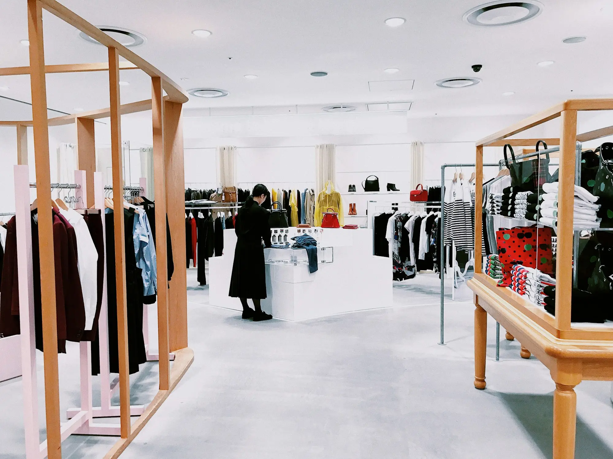 Woman in a newly fitted-out clothing store